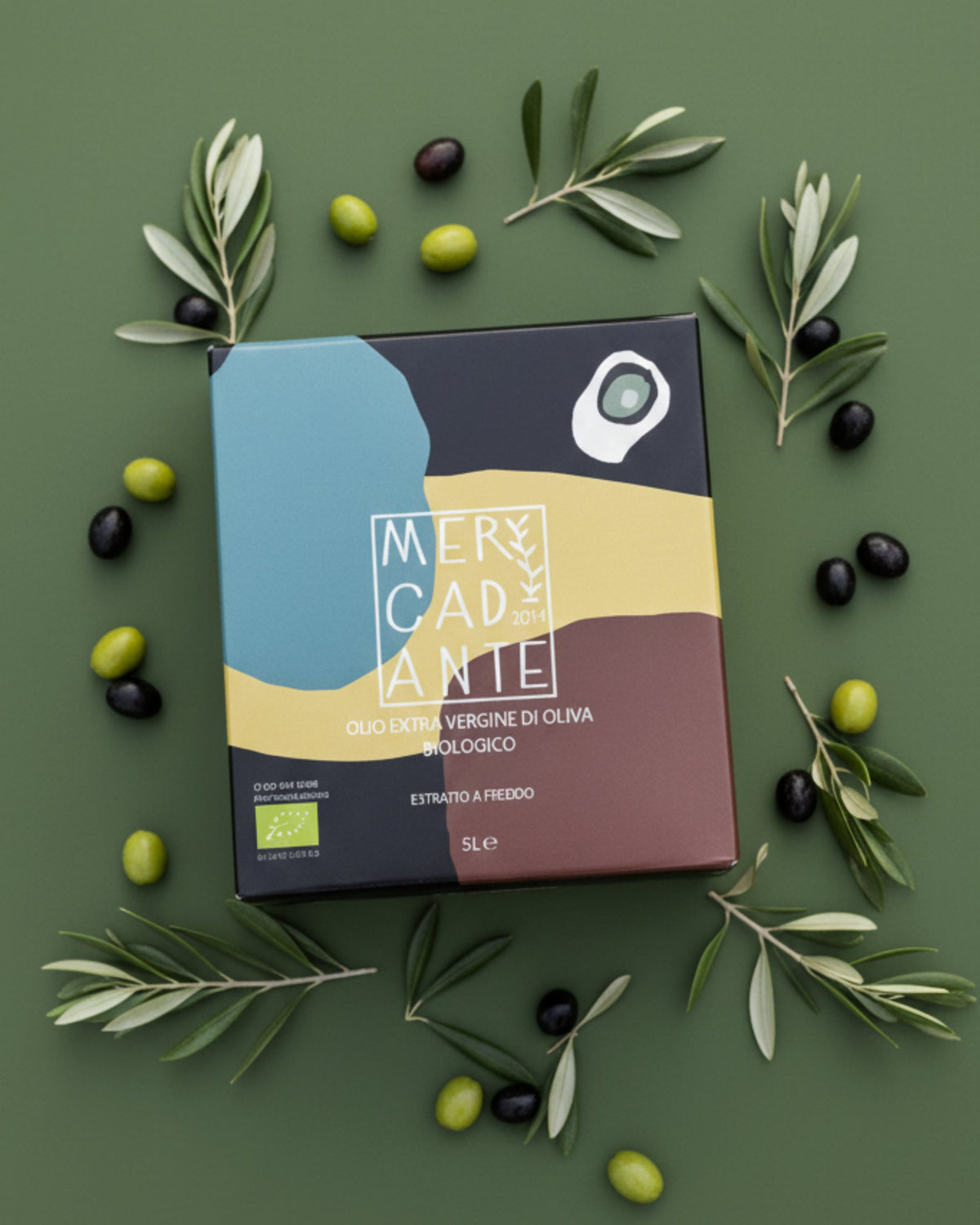 Bag-in-Box di olio EVO Mercadante tra rami d'ulivo